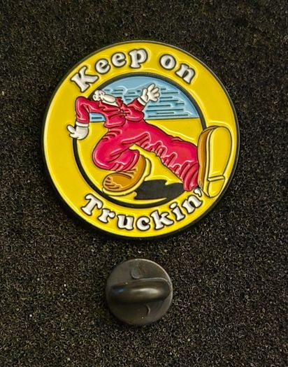 Keep on trucking , pin back badge.