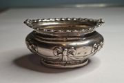 A sterling silver salt cellar by Walker &amp; Hall, Birmingham, 1898