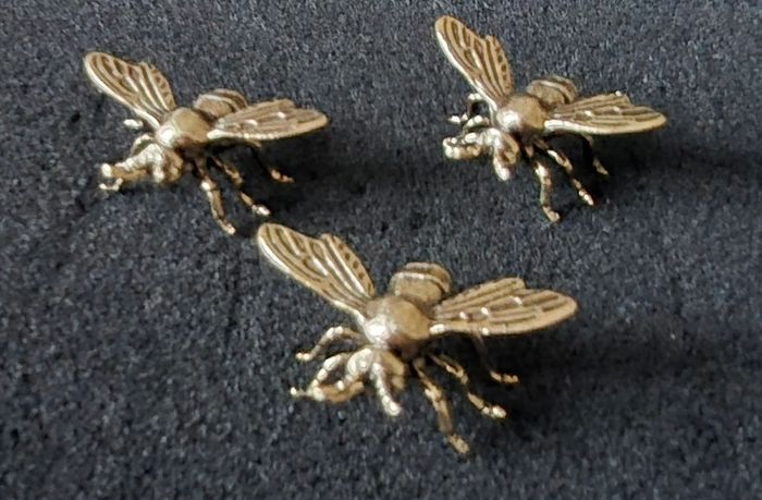 3 brass bees. Solid brass.