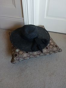 black straw hat
