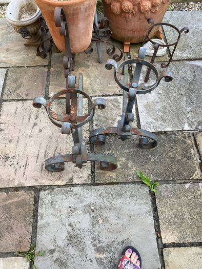 pair of cast iron fire place legs