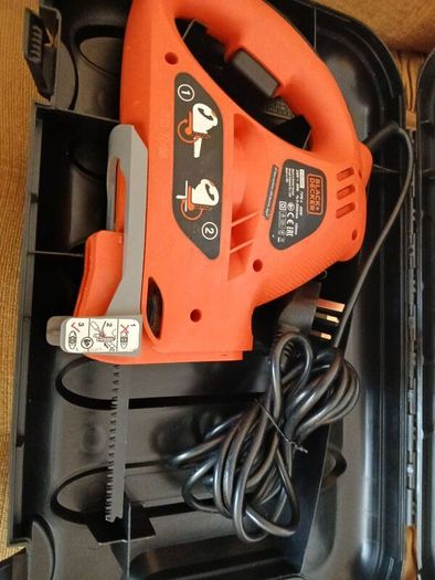 New black n Decker electric saw.
