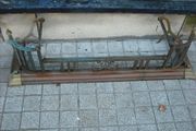 a antique solid brass fender 4 foot long