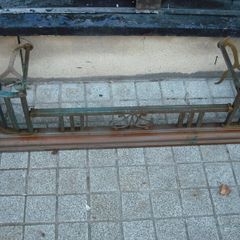 a antique solid brass fender 4 foot long