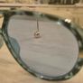 Aviator sunglasses with blue lenses and gold-tone arms Image 6