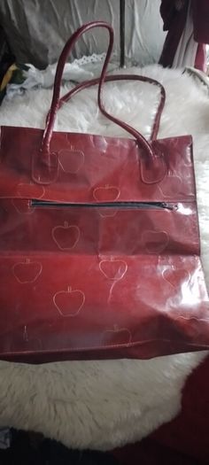 Leather bags one large red long handles tote or shoulde and one smaller shoulder Bag. Shoulder is 15r leather
