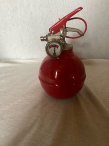 Vintage / Classic Compact Spherical Fire Extinguisher ("Fire Grenade" style shape with a modern valve assembly).