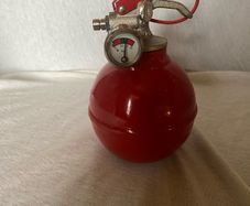 Vintage / Classic Compact Spherical Fire Extinguisher ("Fire Grenade" style shape with a modern valve assembly).