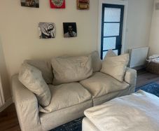 Cream sofa & ottoman