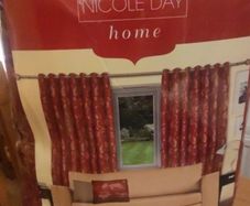 Beautiful Nicole Day curtains 66 x 90.Never been used. Still in original packaging.
