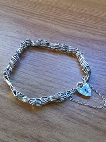 ASJ Sterling Bracelet With Dangling Heart