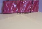 Brand new,  unused Pink Pvc and chrome clutch bag