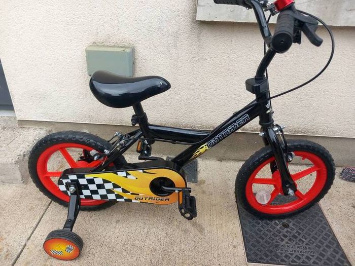 Kids outrider bike size 14 inch wheels