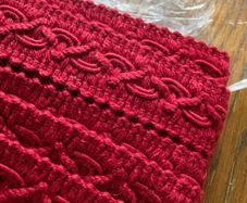 New 5.75 metres of red half in thick upholstery gimp