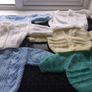New baby cardigans x6 and 2 hats .Hand knit  .2 blue  1 lemon 2 white 1 green 2 blue hats .Size 0-3 months never worn .25 euro the lot .Collection Dublin 13 Image 3