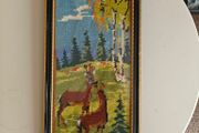 Retro needlepoint wall hanging with scenic forest scene with two deer