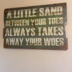 Nautical wall art and clock.