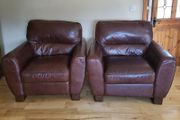 Brown leather armchairs