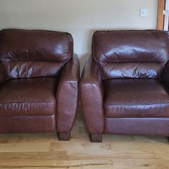 Brown leather armchairs