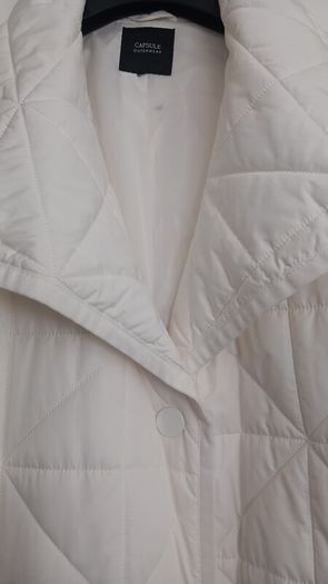 Capsule White Quilted Longline Coat.