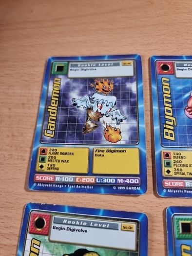 12 Rookie level Digimon cards. 1999