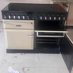 AGA Masterchef electric range cooker in cream with induction cooktop