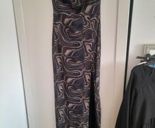 Selling as a bundle ladies selection of dresses and skirts price is for the lot