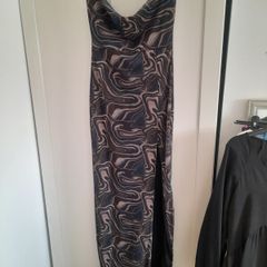 Selling as a bundle ladies selection of dresses and skirts price is for the lot
