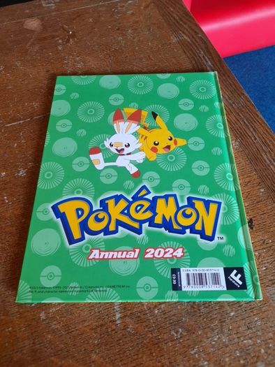 Two Pokemon books E2 each