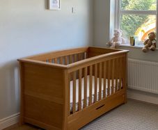Solid oak cot bed