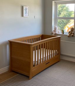 Solid oak cot bed