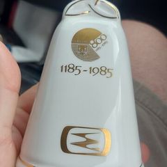 Cork historical itemDesign Features: White fine bone china with gold trim style bell, the official "Cork 800" gold graphic with the city crest, and the prominent "1185-1985" date marker. ,  vintage Royal Tara memorabilia,sold as is.