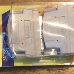 2x SCSI Terminators - Passive & Active - features two screw latches, a 50-pin SCSI connector