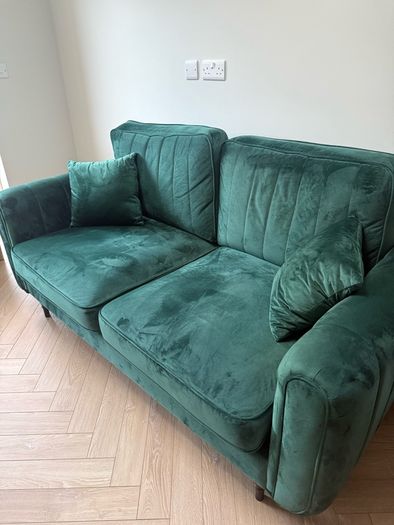 Green velvet sofa
