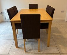 Table & 6 Brown Fabric Chairs