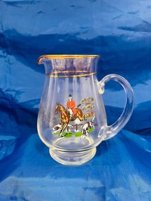 glass jug with hunting scene