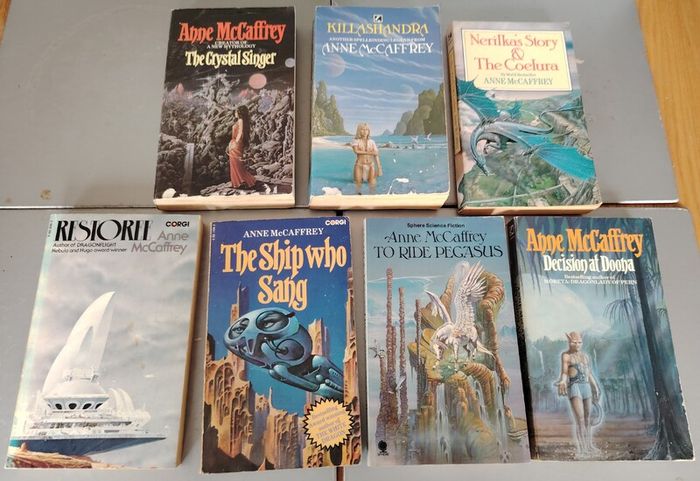 A collection of  7 Anne McCaffrey Books