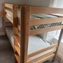 Bunk bed with attached slide and mattresses Image 7