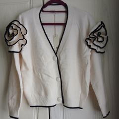 By clara Cardigan