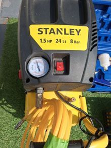 compressor spray gun new 2 tac guns boxes of staples and tacks. 1 dust gun