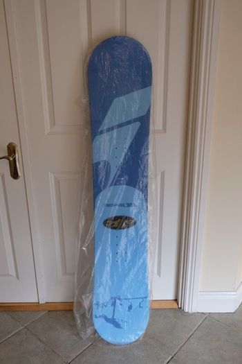 Snowboard, bindings and helmet