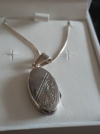 silver chain and locket