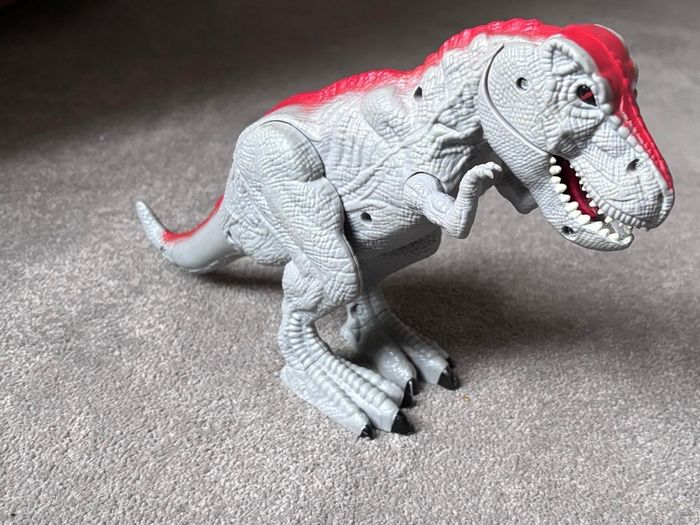 Dinosaur figure with a noisy roar