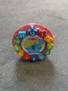Melissa and Doug shape sorting clock