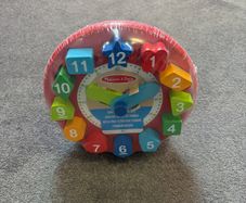 Melissa and Doug shape sorting clock