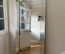 Frameless bevelled full-length mirror