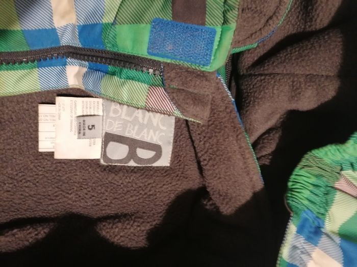 Young boys ski jacket and salopettes