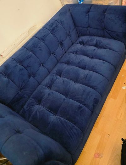 Blue velvet sofa
