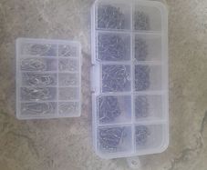 2 Boxes of small fishing hooks
