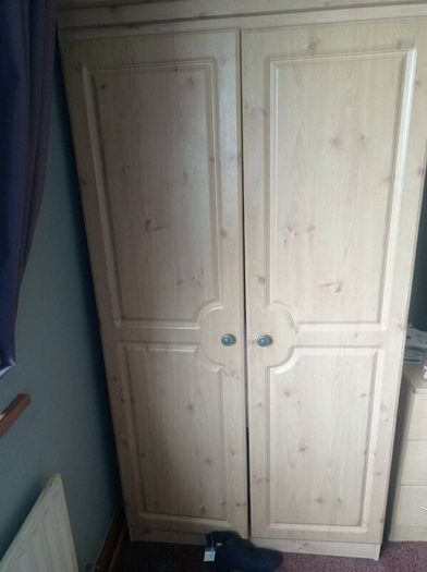 A wardrobe and dressing table